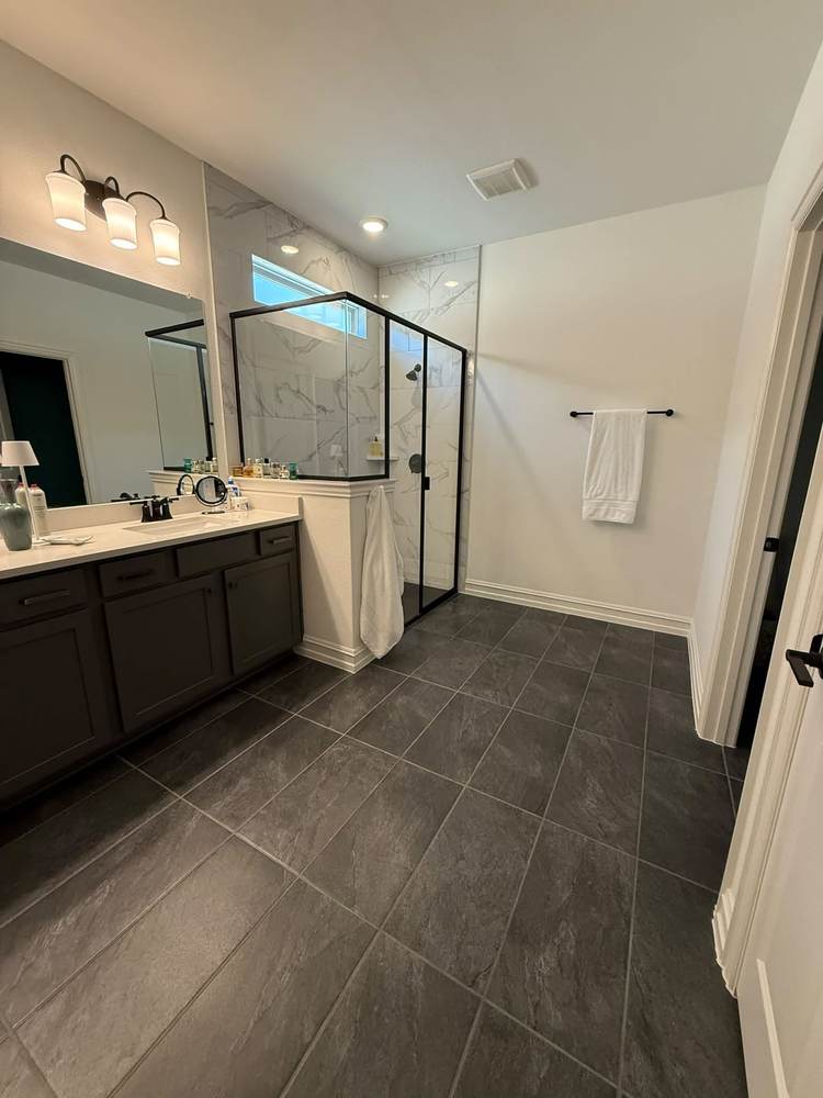 Detailed bathroom cleaning with polished tile floors